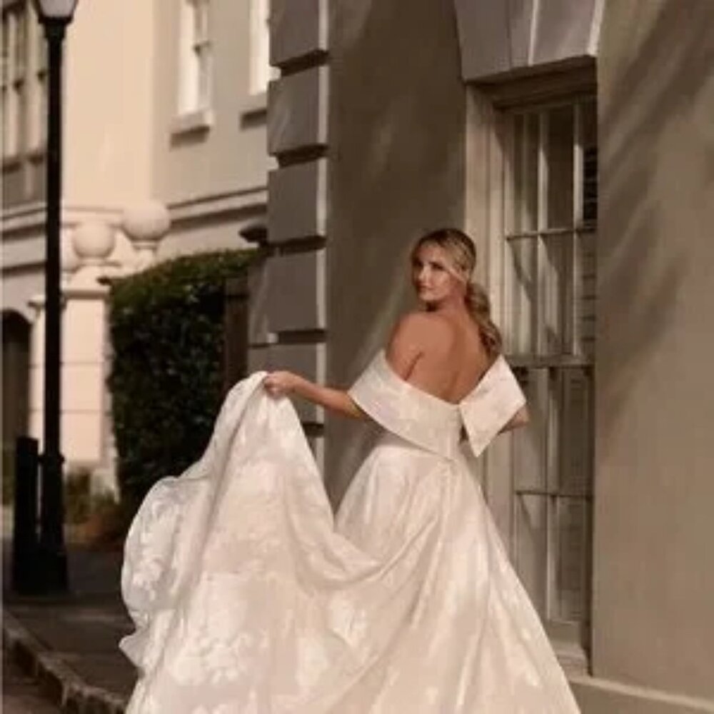 Cream Off-Shoulder Wedding Gown with detachable shawl bodice